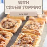 Apple Danish pastries with crumb topping and icing rest on a baking sheet, labeled as a simple recipe.